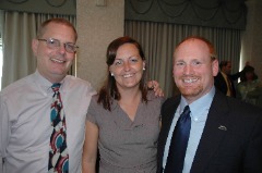 Mark Fleming with Dave Wrath (Augustana) and current CoSIDA President Cindy Potter (Columbia College Mo.) after Fleming was named to the CoSIDA Board of Directors at the 2011 CoSIDA Convention.